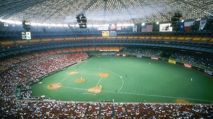 A baseball game being played at the Astrodome